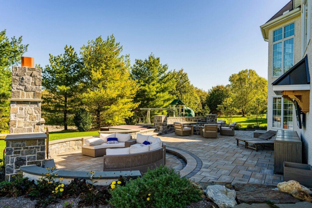JHL Landscaping - Patio surrounded by a garden